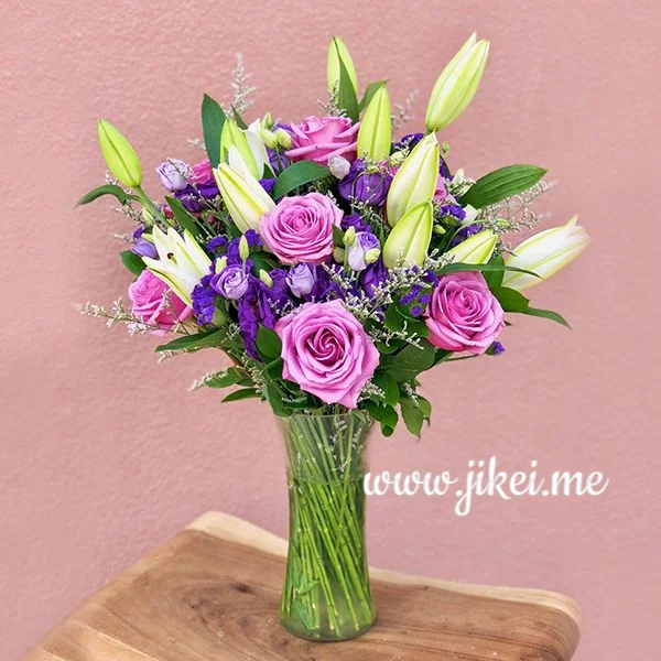 Lillies and roses on vase