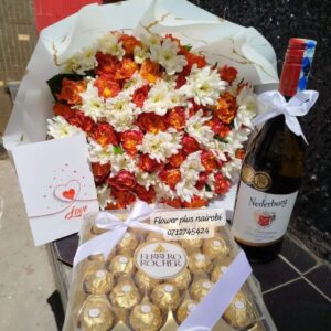 Ferrero chocolate 24pcs , Nederburg wine and a well crafted flower arrangement