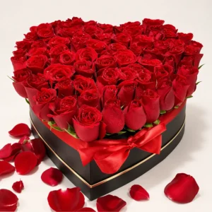 Red roses heart-shaped box arrangement with red ribbon in Nairobi