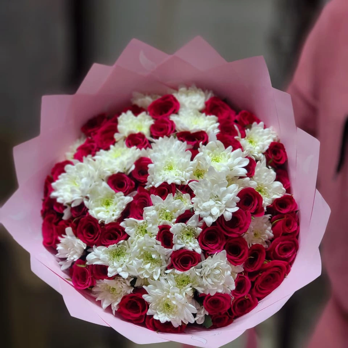 Red roses and white chrysanthemums bouquet with pink wrapping in Nairobi