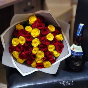 Red and yellow roses with Robertson sweet red wine in Nairobi