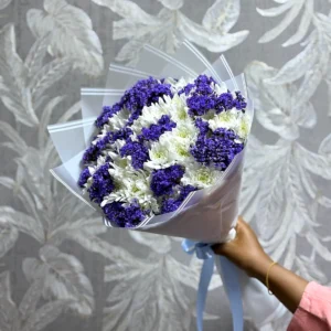 White chrysanthemums and purple statice bouquet in Nairobi