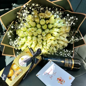 White roses bouquet with Ferrero Rocher and Crema Nobile chocolate wine in Nairobi