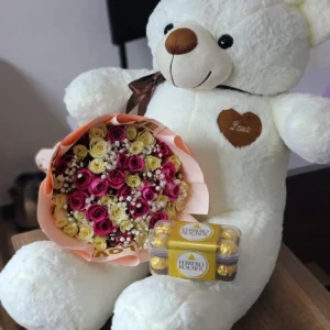 White teddy bear with mixed roses and Ferrero Rocher chocolates Nairobi